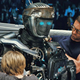 Hugh Jackman works on a robot in Real Steel.